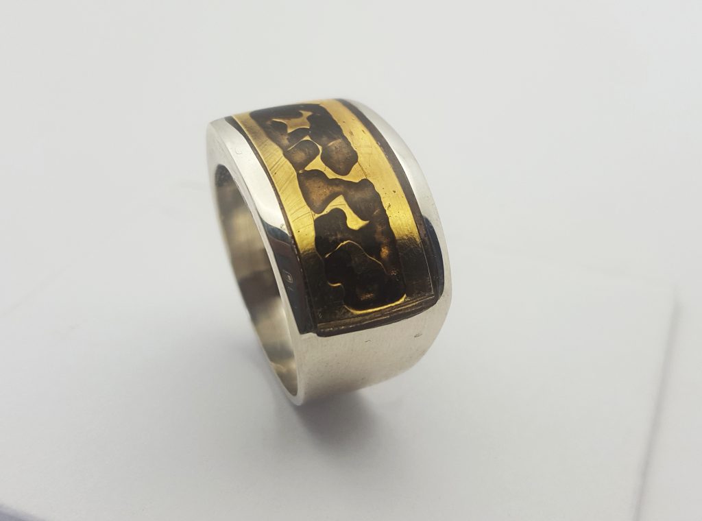 bague MCM bronze